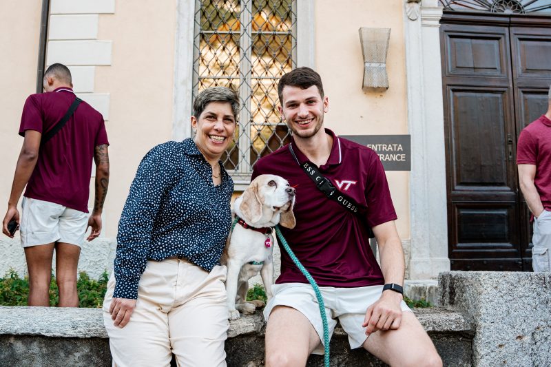 Sara Steinert-Borella and Robbie Beran pose with Stevie the dog