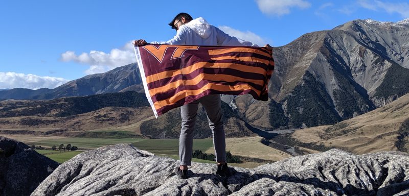 Man standing with VT Flag