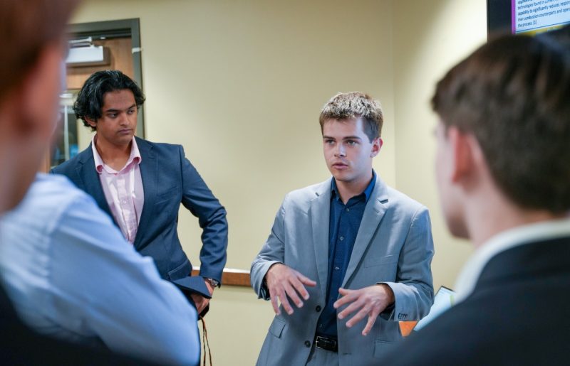 A student speaks to representatives from Boeing