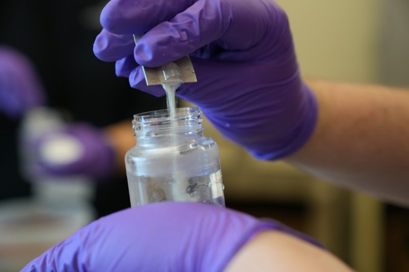 A packet dissolves in water prior to testing.