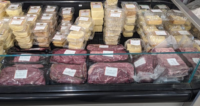 A store refrigerator display shows meat for sale produced by the Buckingham Cattlemen's Association.