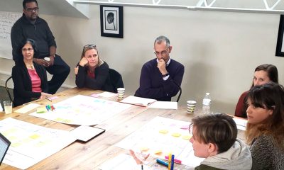 People sitting around a conference table