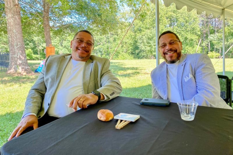 Two men sitting at a table