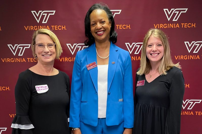 Three women in front of a VT backdrop