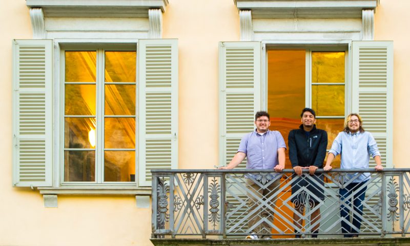 Students on a balcony at the Steger Center